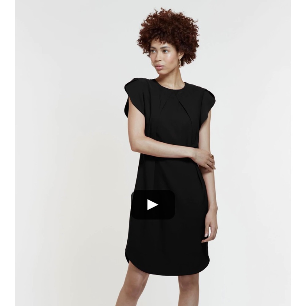 Black “The Sakura Dress” from Mitera. Nursing/pregnancy friendly dress. Small
